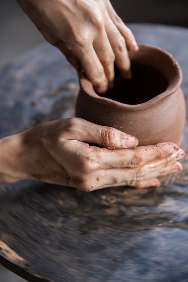 Hand Transforming Clay